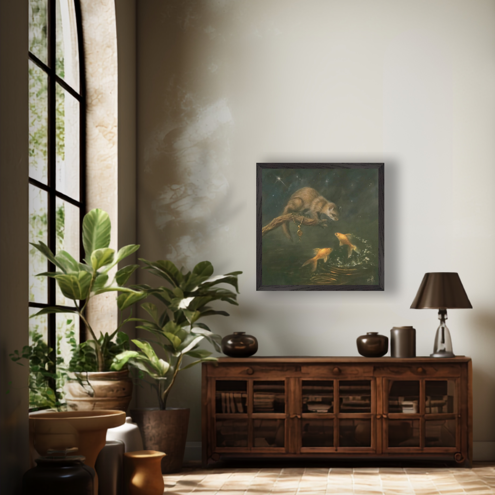 A framed art print depicting a dramatic scene of a pine marten and goldfish at night, displayed on a beige wall above a dark wood cabinet in a styled room with plants and a lamp.