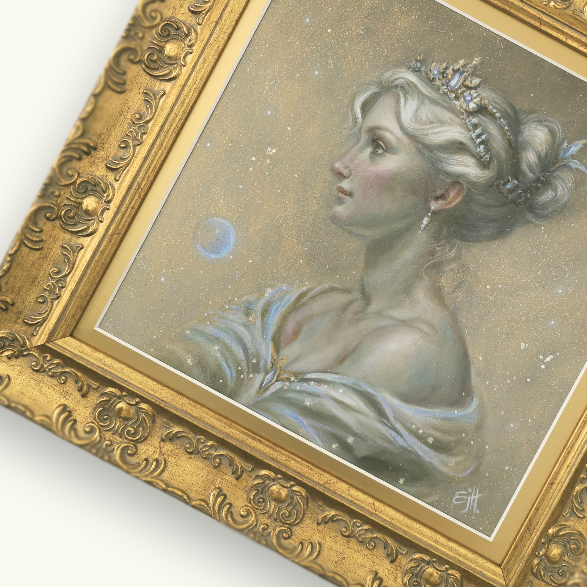 Portrait of a woman with a tiara in an ornate gold frame