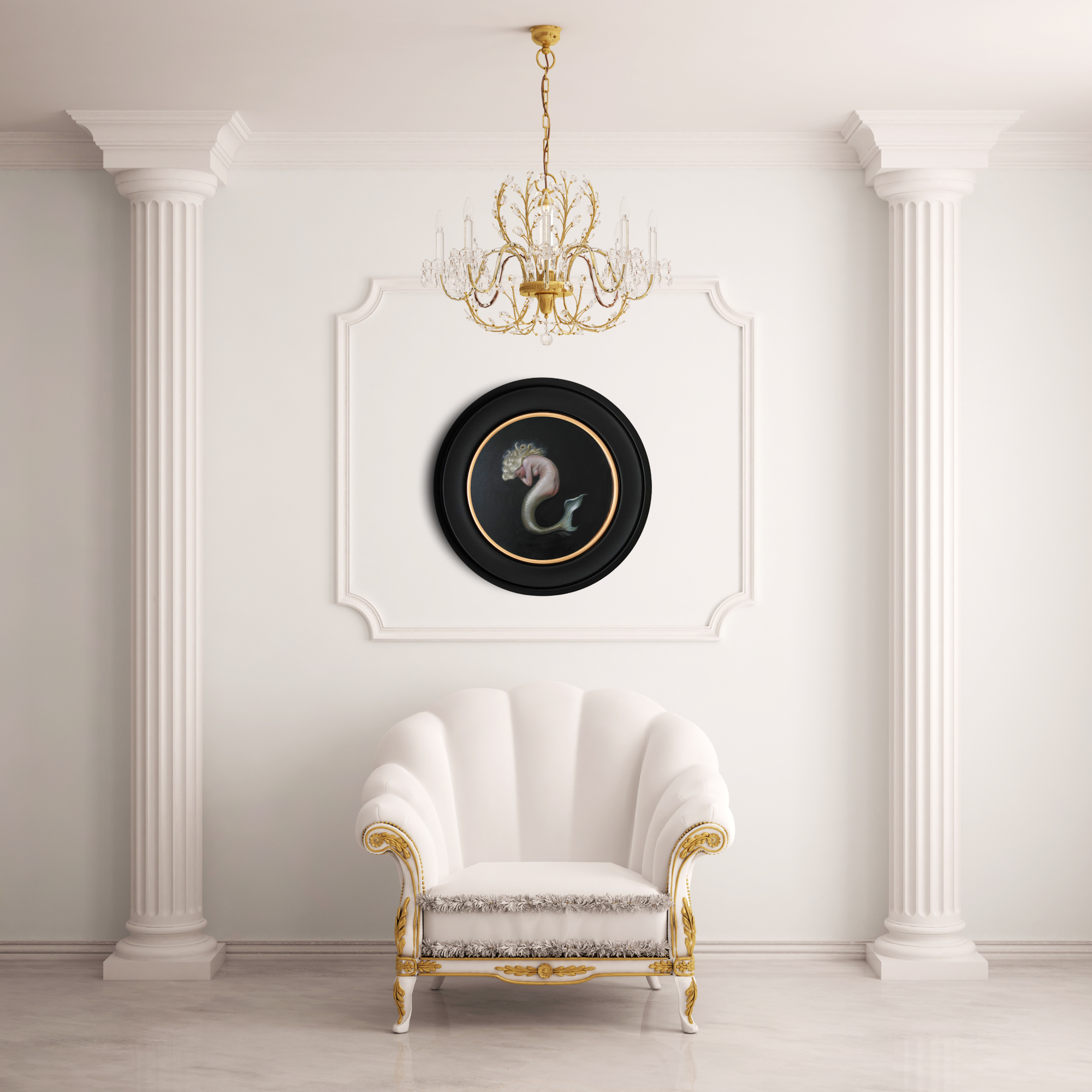 Elegant interior with a white armchair, gold-framed wall art, and chandelier.